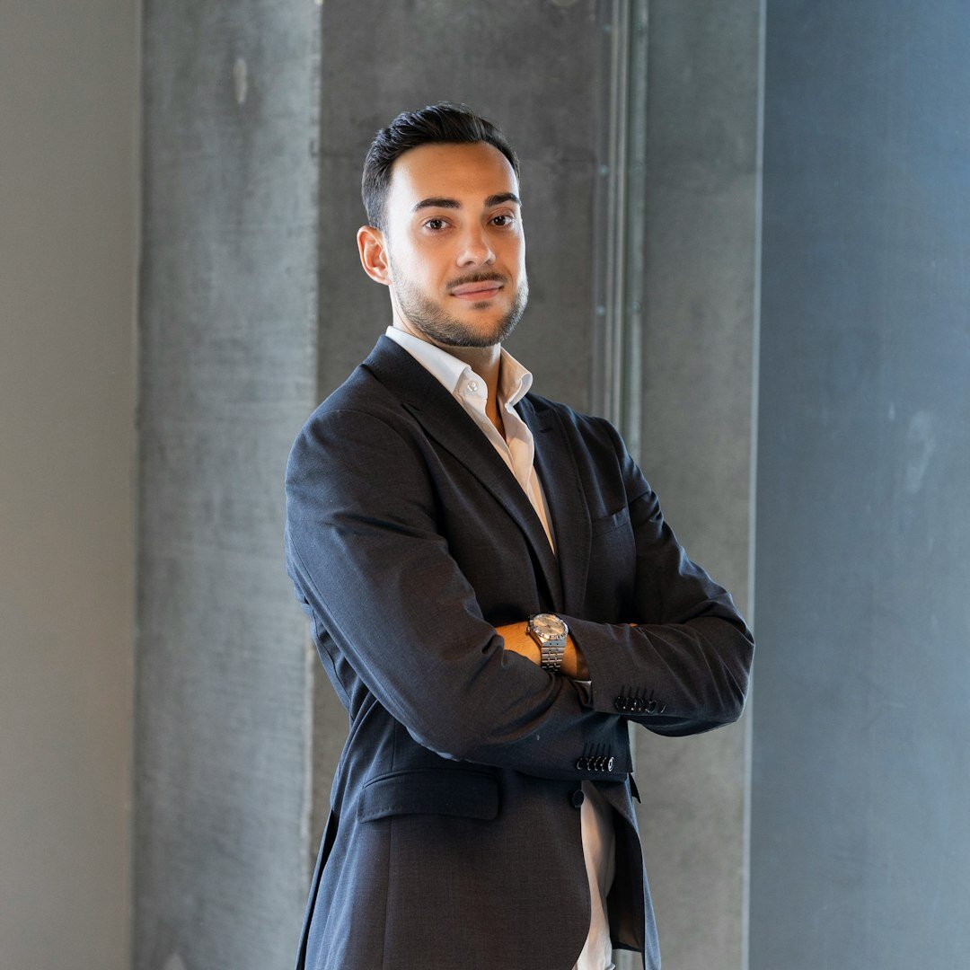 Professional Turkish male analyst technology writer portrait